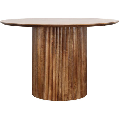 Shelva Dining Table by Arch & Plane in medium brown. Made from mango wood in a transitional style.