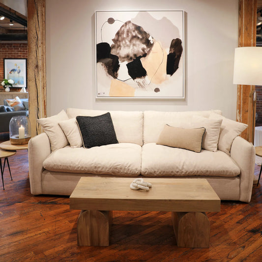 Casimiro Coffee Table by Arch & Plane in light natural. Made from mango wood in a unique style.