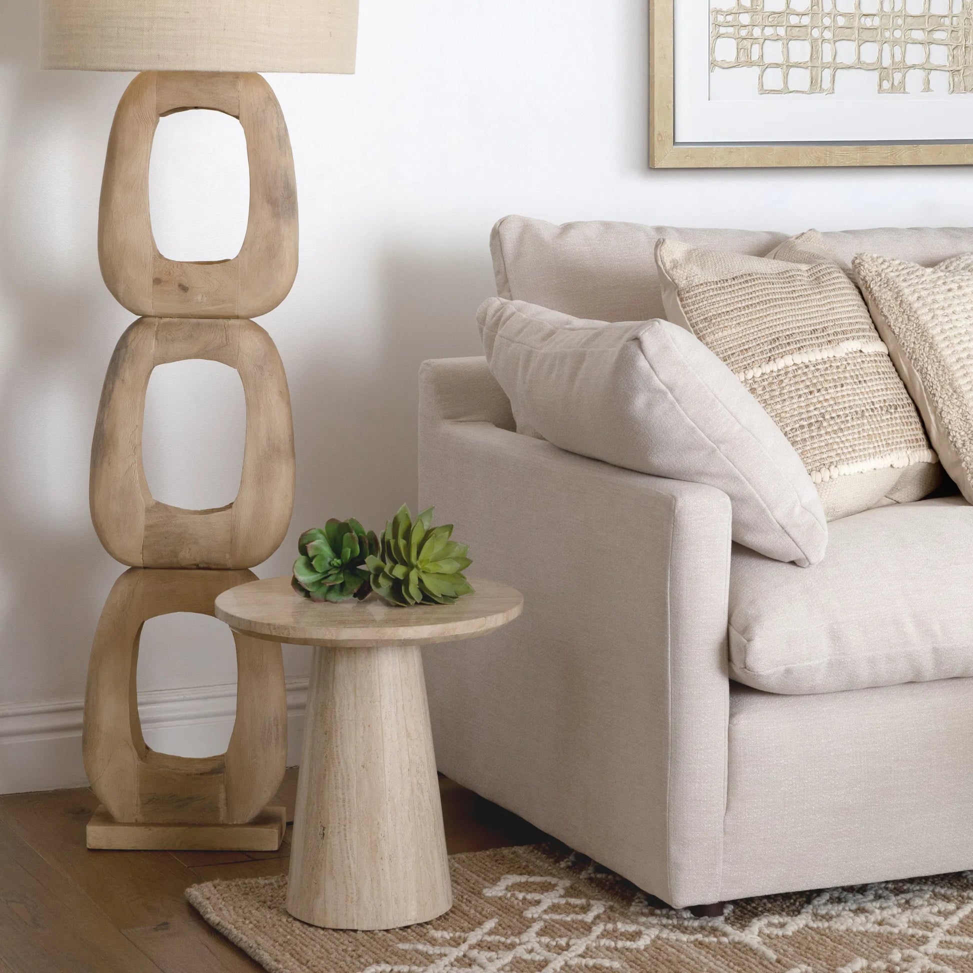 Willow End Table by Arch & Plane in beige. Made from travertine stone in a transitional style.