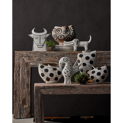 Norman the Peacock by Currey and Company in washed white, black. Made from porcelain in a eclectic & global style.