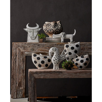 Spot the Dog by Currey and Company in washed white, black. Made from porcelain in a eclectic & global style.