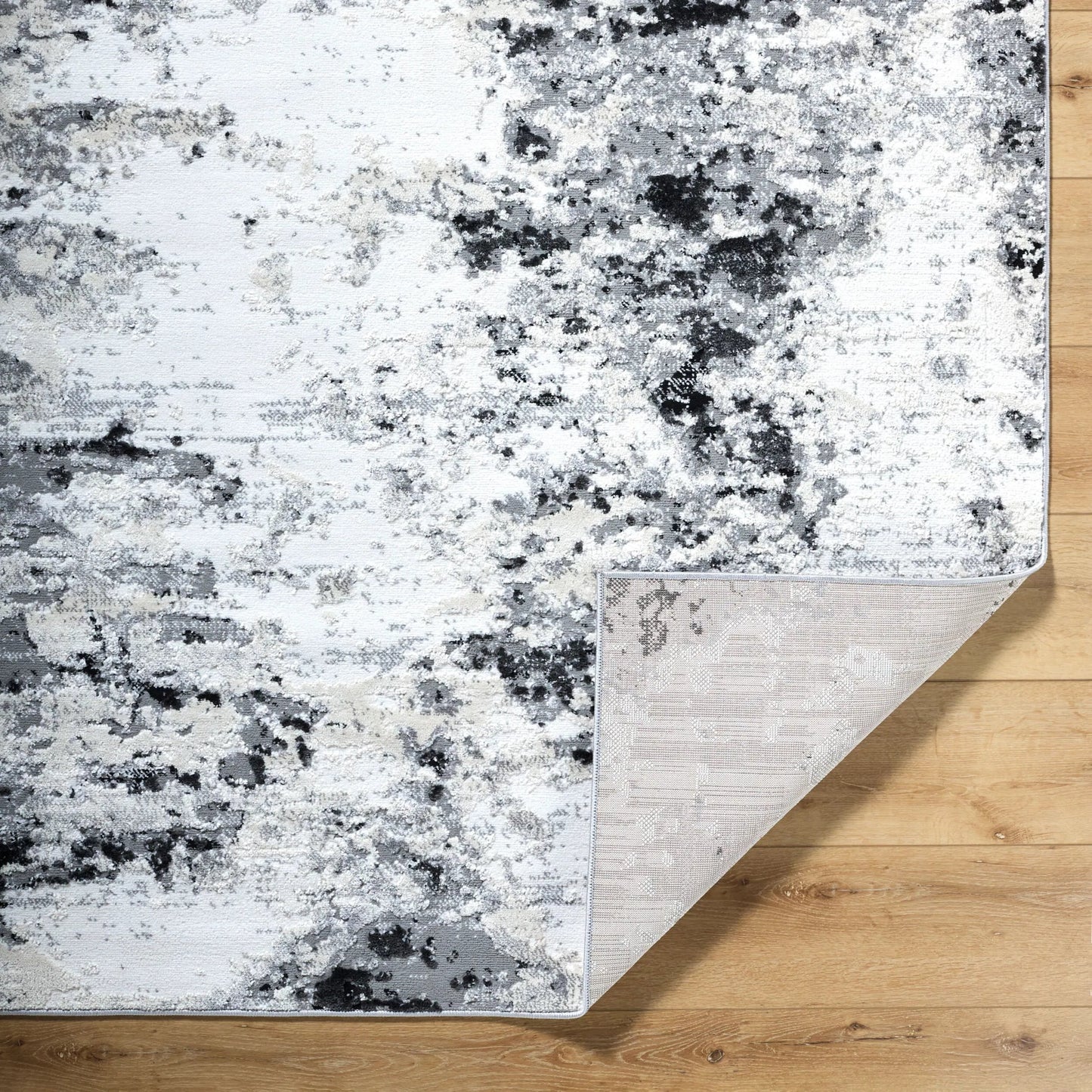 006 SI-2169024,SI-2169025 | Closeup | Siyah SIY-2308 Rug by Livabliss in white, gray, black. Made from polyester, polypropylene in a unique style.