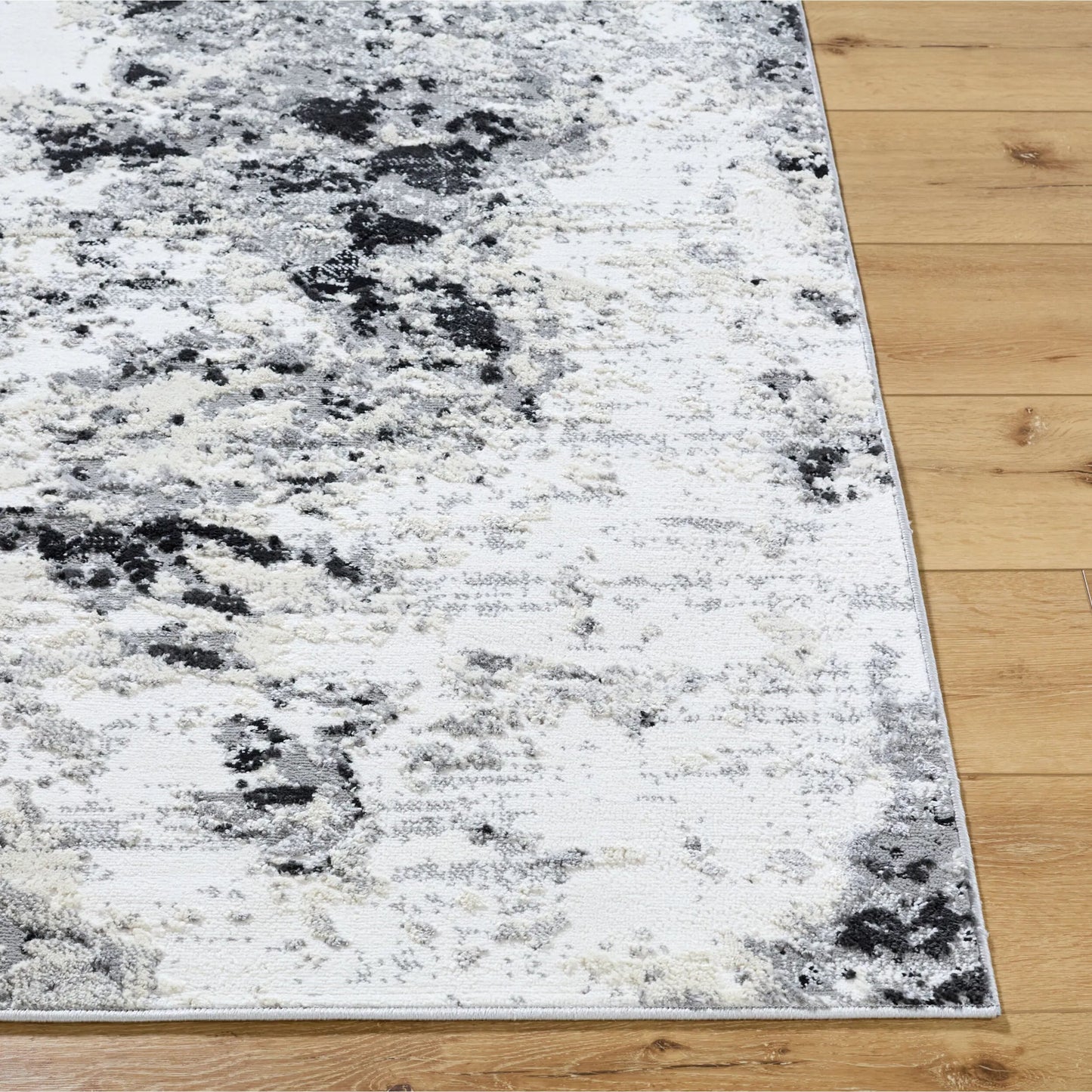007 SI-2169024,SI-2169025 | Closeup | Siyah SIY-2308 Rug by Livabliss in white, gray, black. Made from polyester, polypropylene in a unique style.