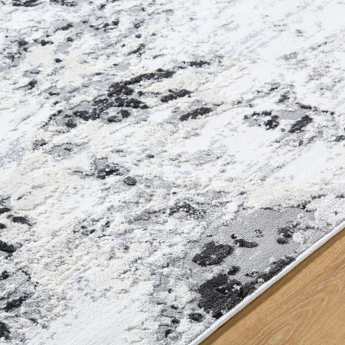 008 SI-2169024,SI-2169025 | Closeup | Siyah SIY-2308 Rug by Livabliss in white, gray, black. Made from polyester, polypropylene in a unique style.