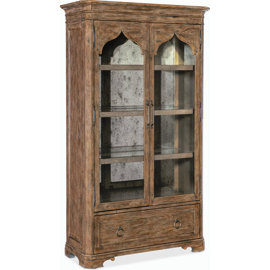 Americana Display Cabinet by Hooker Furniture in brown and honey finish. Made from oak veneers with light, tempered glass in a cottage & farmhouse style.