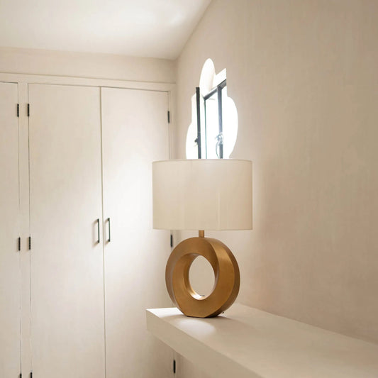 Iris Table Lamp by LH Imports in brass, off-white and antique brass. Made from aluminium, linen fabric in a unique style.