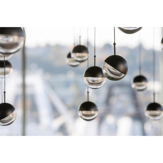 Dora Pendant by Seed Design. Made from steel, clear glass in a modern style.