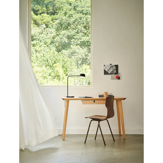 Olo Table Lamp by Seed Design in black/shiny black. Made from steel in a modern style.