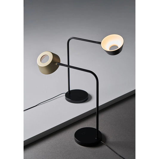 Olo Table Lamp by Seed Design in black/champagne gold. Made from steel in a modern style.