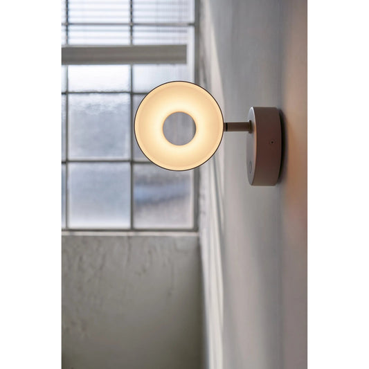 Olo Wall Lamp by Seed Design in oatmeal. Made from metal, aluminum in a modern style.