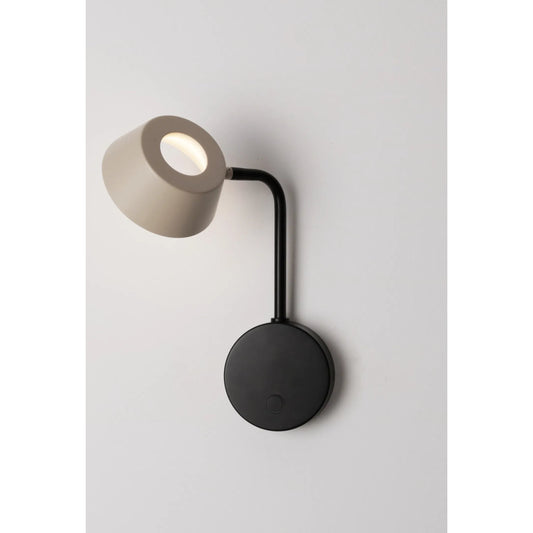 Olo Arm Wall Lamp by Seed Design in black/oatmeal. Made from metal, aluminum in a modern style.