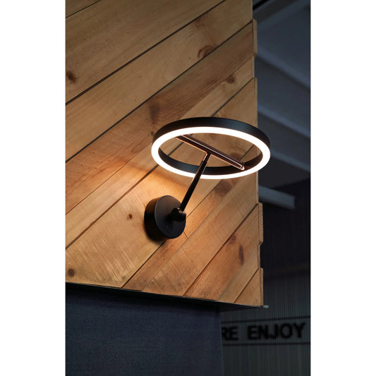 Sol Wall Sconce by Seed Design in black, copper. Made from metal, aluminum in a modern style.