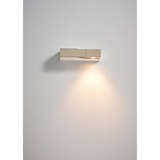Wu Wall Lamp by Seed Design in oatmeal/ white. Made from steel, aluminum in a modern style.