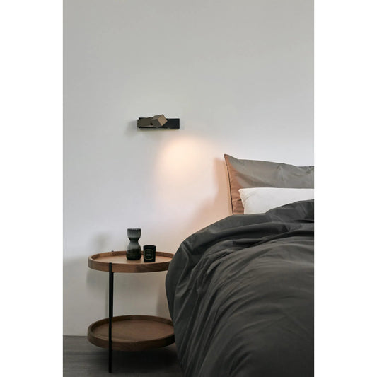 Wu Wall Lamp by Seed Design in pearl cocoa/ black. Made from steel, aluminum in a modern style.