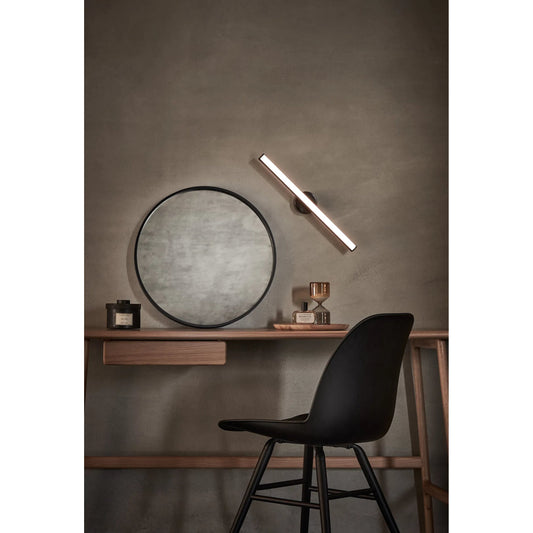 Lisa Wall Lamp by Seed Design in black. Made from steel, aluminum, pc diffuser in a modern style.