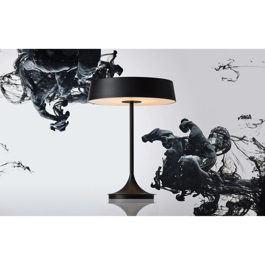 Graceful Led Table Lamp by Seed Design. Made from steel in a modern style.