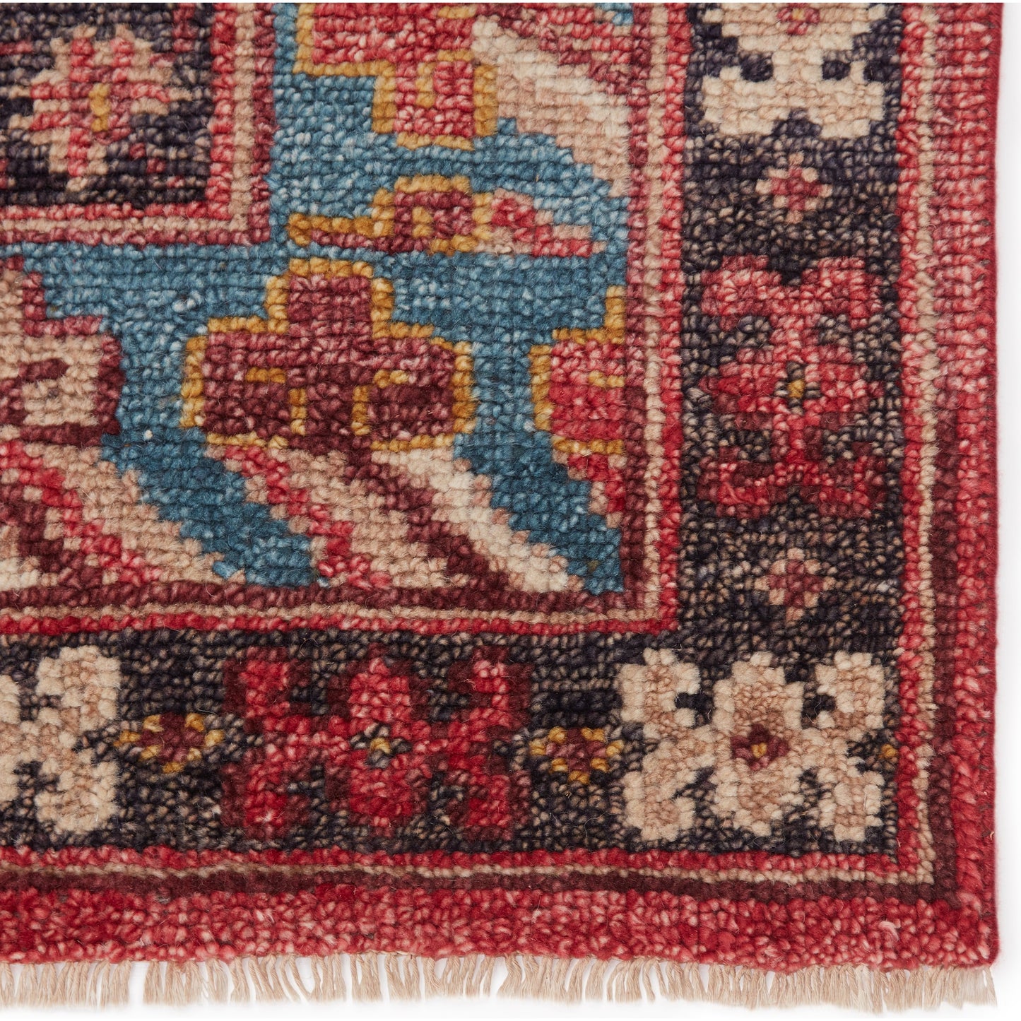 004 SI-1750508,SI-1750511 | Closeup | Donte Rug by Jaipur Living in red, blue. Made from 100% wool in a unique style.