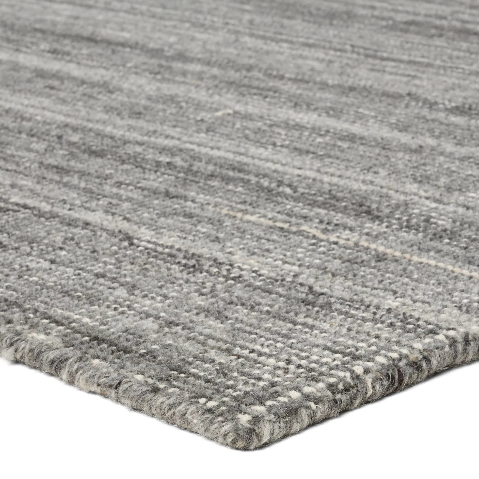 Solon SLO01 Rug by Jaipur Living in gray. Made from 60% wool, 40% cotton in a unique style.