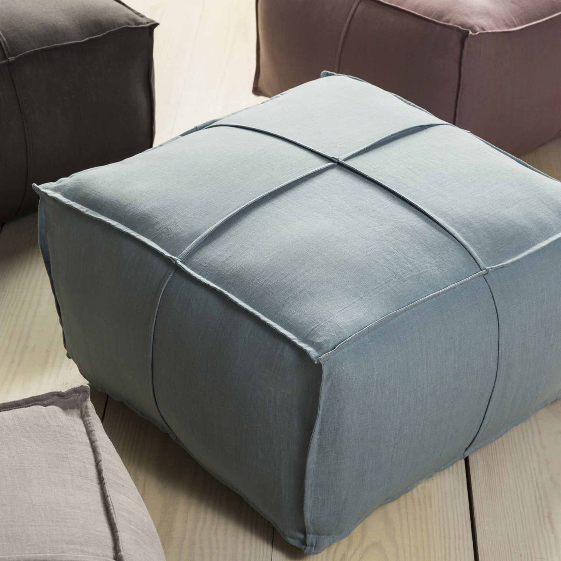 Solid Linen Pouf - 20564 by Livabliss. Made from front: 100% cotton, back: 100% cotton in a modern style.