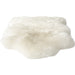 Lalo Lambskin Throw by Four Hands. Made from shearling in a rustic style.