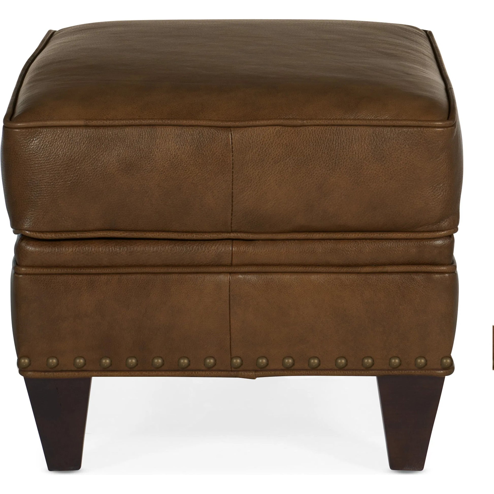 Carrado Ottoman by Bradington-Young by Hooker Furniture in brown and plantation finish, brass. Made from 100% leather in a unique style.