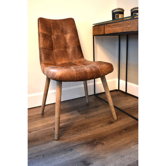 Mackenzie Dining Chair by LH Imports in brown. Made from ash, leather, pu foam, polyester fiber in a modern style.