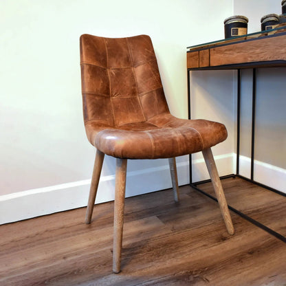 Mackenzie Dining Chair by LH Imports in brown. Made from ash, leather, pu foam, polyester fiber in a modern style.