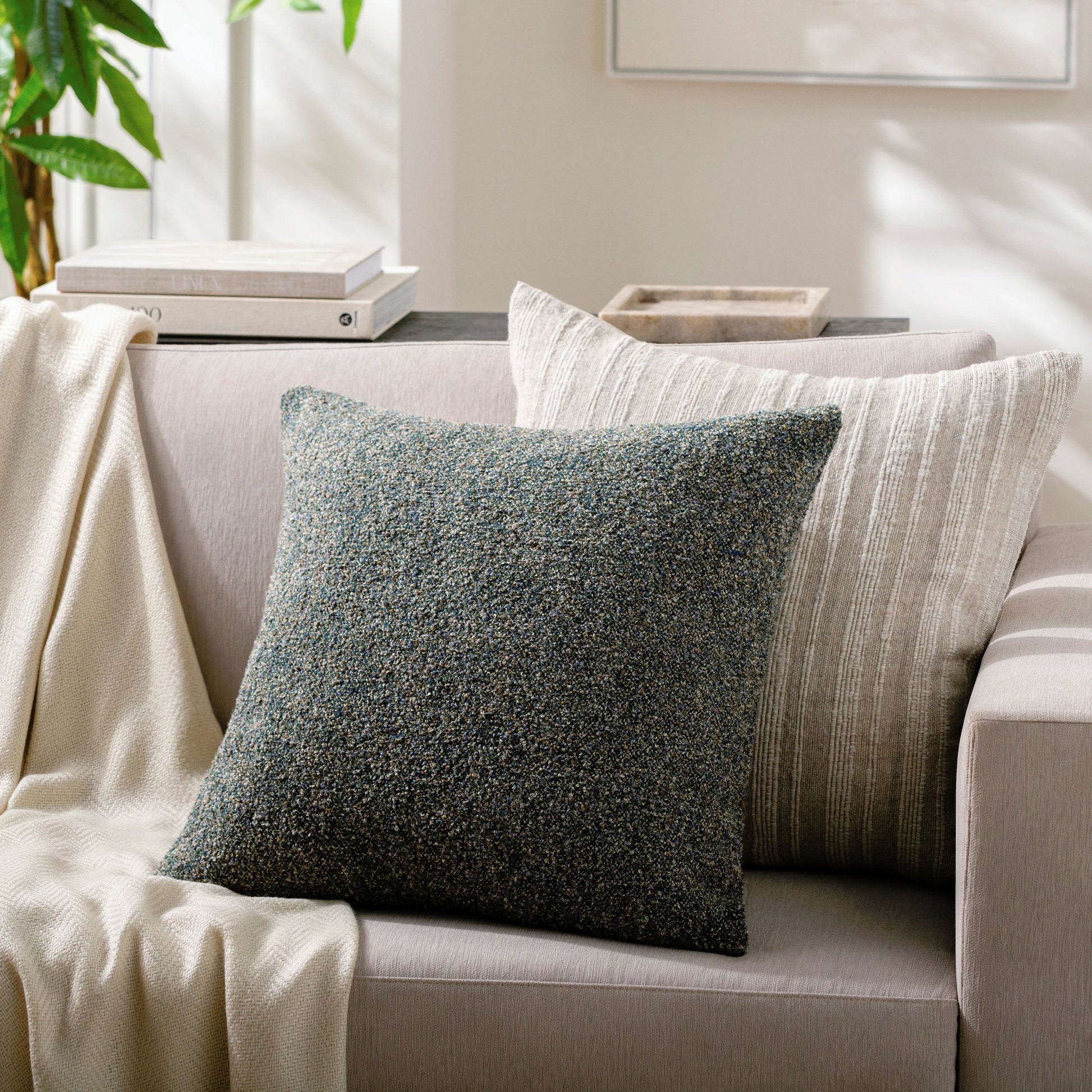 Saanvi Indoor/Outdoor Pillow by Surya. Made from polyester, cotton in a modern style.