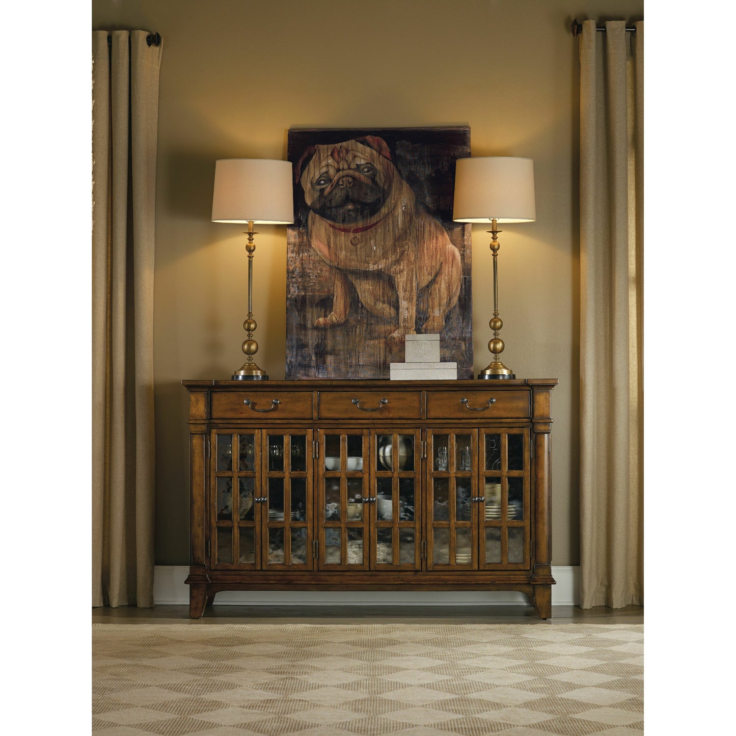 003 SI-1749935 | Lifestyle | Tynecastle Buffet by Hooker Furniture in chestnut. Made from alder veneers, seeded glass in a traditional style.