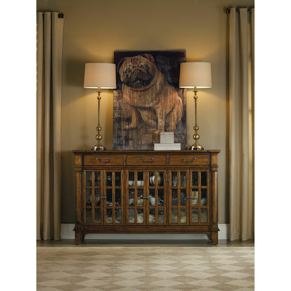 Tynecastle Buffet by Hooker Furniture in chestnut. Made from alder veneers, seeded glass in a traditional style.