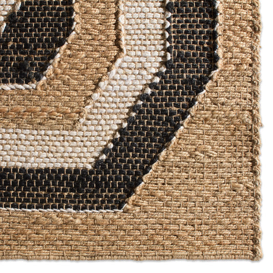 Song Of The Sahara SOS02 Rug by Jaipur Living in tan, beige, black. Made from 100% jute in a unique style.