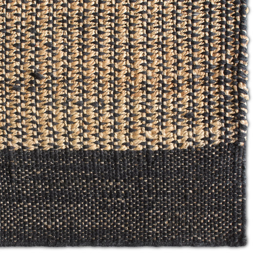 Song Of The Sahara SOS03 Rug by Jaipur Living in black, tan, beige. Made from 80% jute 20% wool in a unique style.