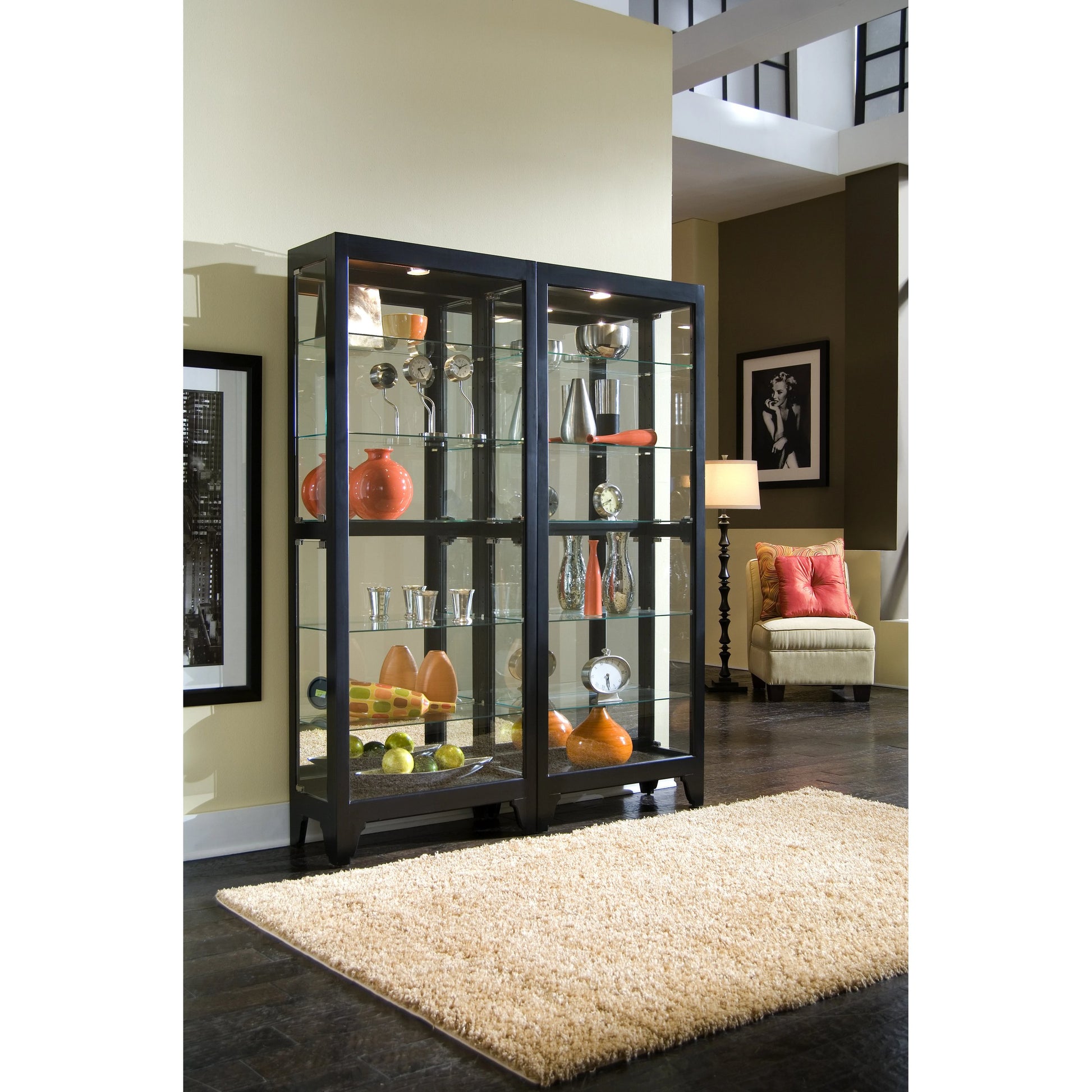 29'' Wide Hardwood Onyx Black Curio Display Cabinet by Pulaski Furniture in black onyx. Made from select hardwoods in a traditional style.