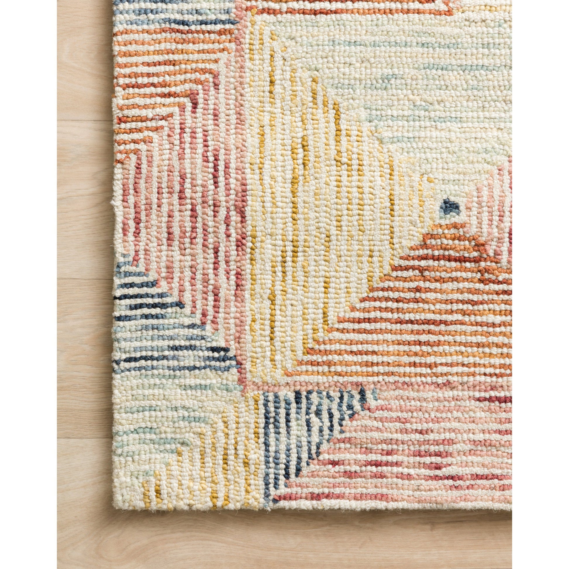 SPE-01 by Loloi. Made from 100% wool in a rustic style.