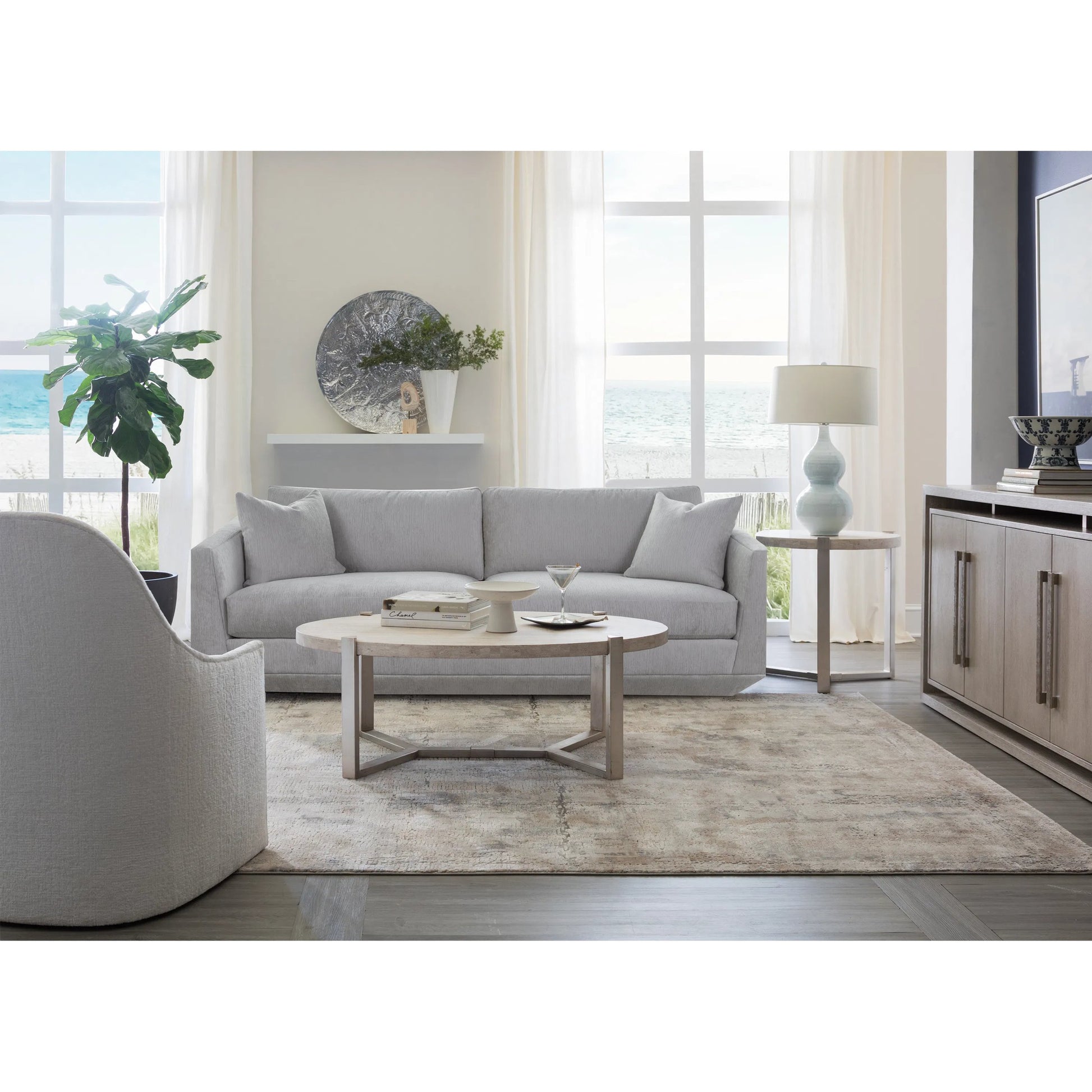 Denizen Cocktail Table by Artistica Home in champagne silver leaf. Made from unique in a modern style.