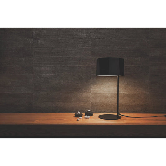 Zhe Table Lamp by Seed Design in black. Made from steel in a modern style.