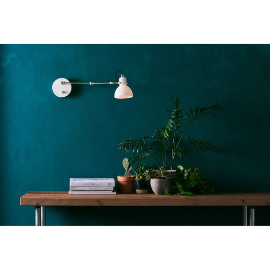 Laito Opal Wall Lamp by Seed Design in white opal glass, matt brass. Made from steel in a modern style.