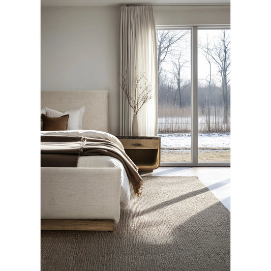Stone Ridge Upholstered Bed by Jonathan Charles in tully light acacia. Made from acacia veneer in a unique style.