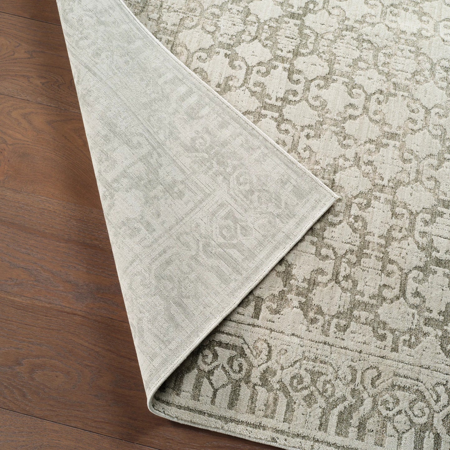 006 SI-2542847,SI-2542848,SI-2542849,SI-2542850,SI-2542851,SI-2542852 | Closeup | Serenita SRE06 Rug by Jaipur Living in green, ivory, white. Made from 100% polyester in a unique style.