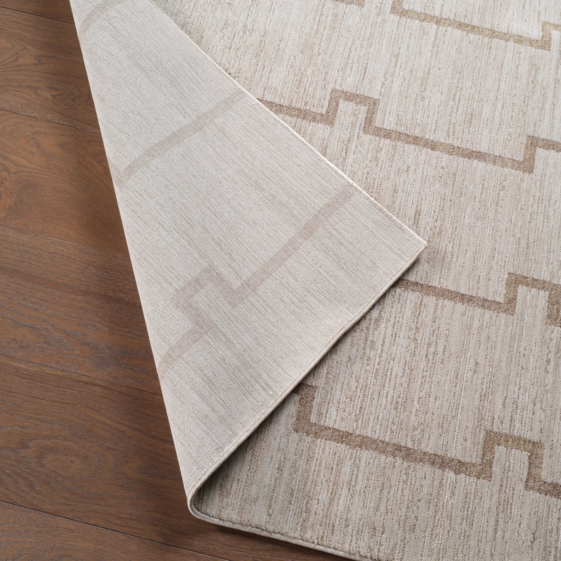 Serenita SRE08 Rug by Jaipur Living in ivory, white, tan, beige. Made from 100% polyester in a unique style.