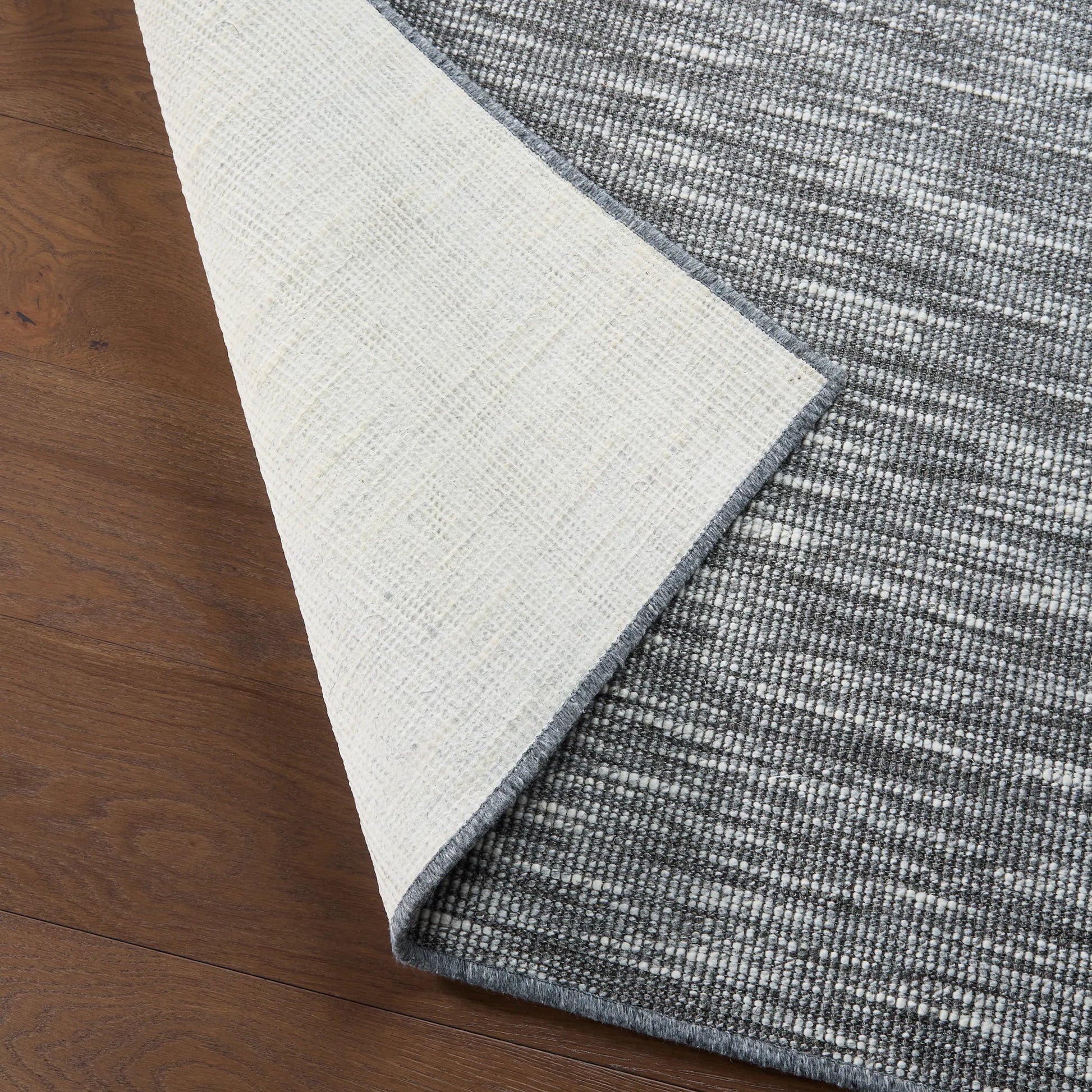 Story Loom STL02 Rug by Jaipur Living in gray. Made from 82% sisal 18% wool in a unique style.