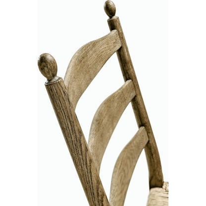 Timeless Doppler Ladderback Side Chair by Jonathan Charles in brown. Made from oak, fiber rush, foam, fabric in a coastal style.