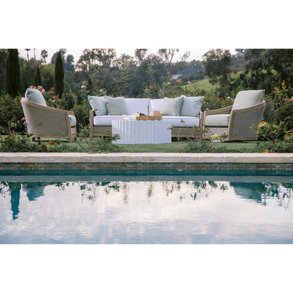 Cambria Outdoor Sofa by Sunset West in light wood. Made from teak in a rustic style.