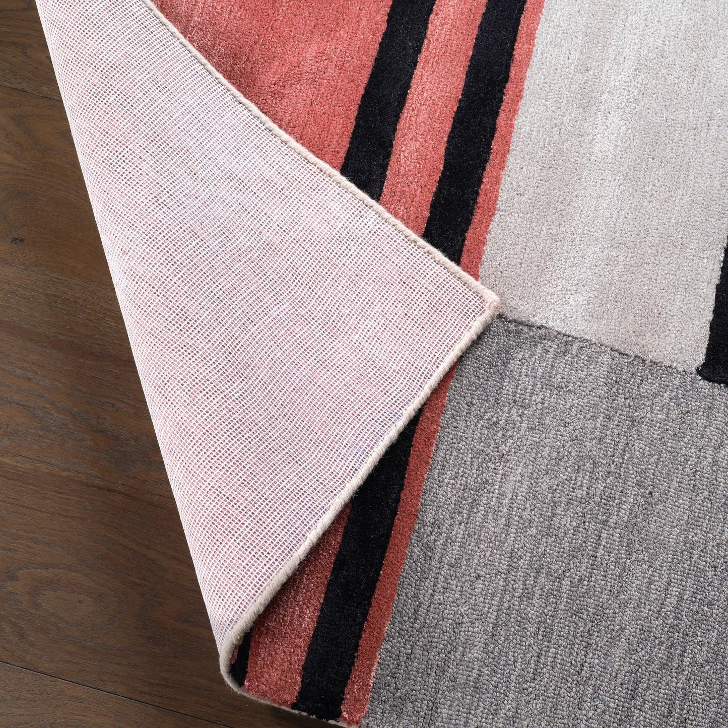 004 105554-45456,105554-45457,105554-45458,105554-45459 | Closeup | Syntax SYN04 Rug by Jaipur Living in pink, red. Made from 61% viscose, 39% wool in a unique style.