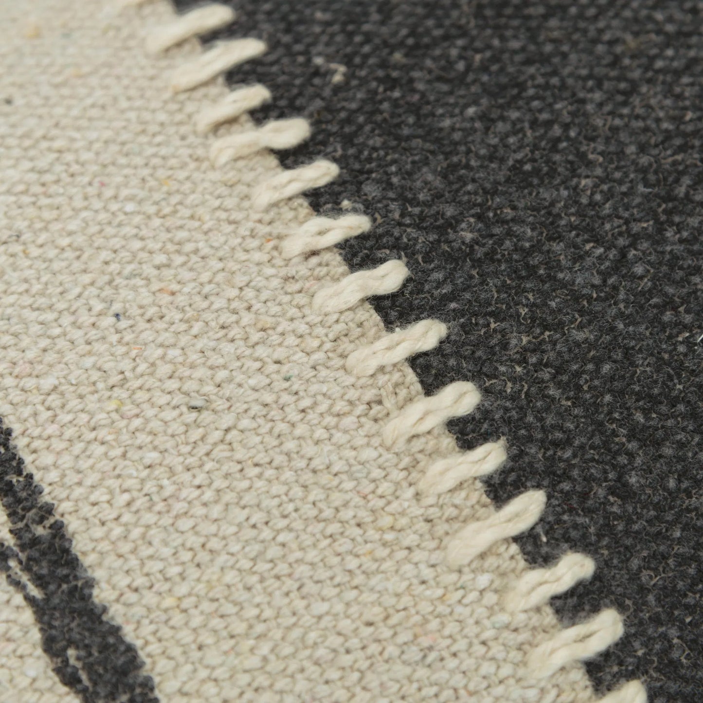 002 SI-2438620 | Closeup | Turkey Pillow by HedgeApple Essentials in black, ivory. Made from cotton canvas in a eclectic & global style.