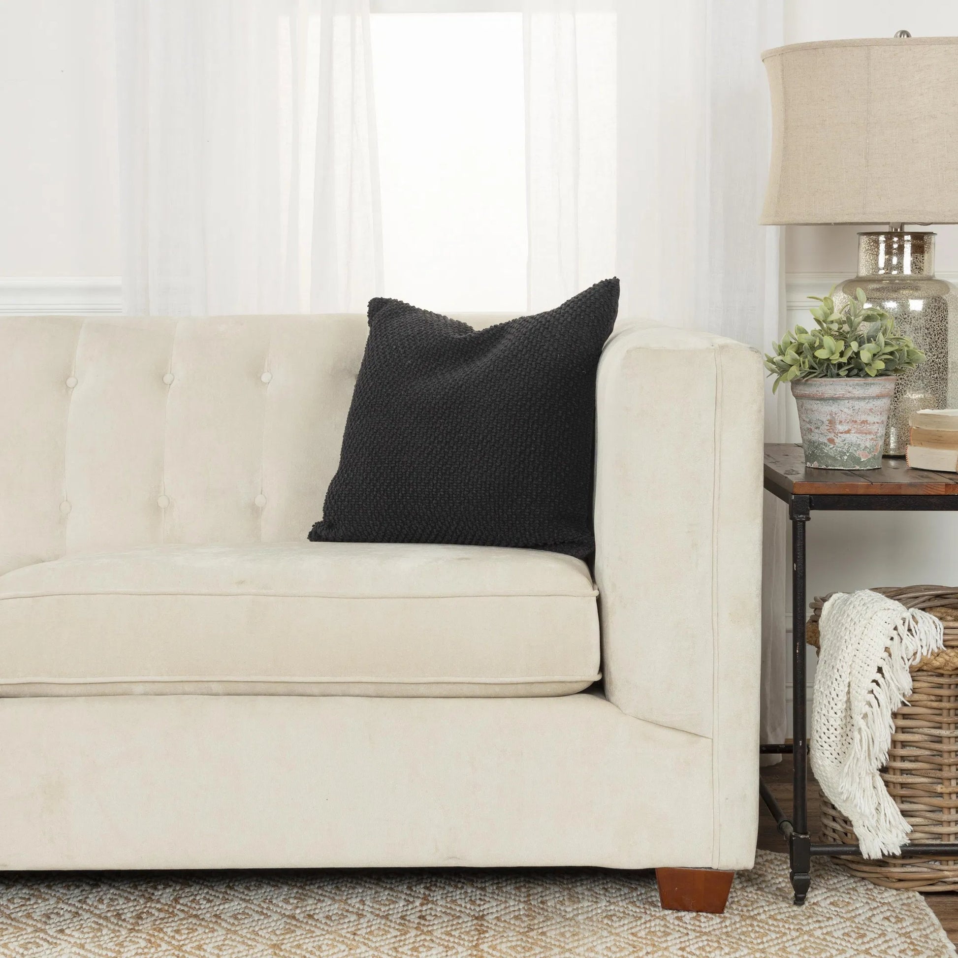 Kanawha Pillow by HedgeApple Essentials in black. Made from cotton in a modern style.