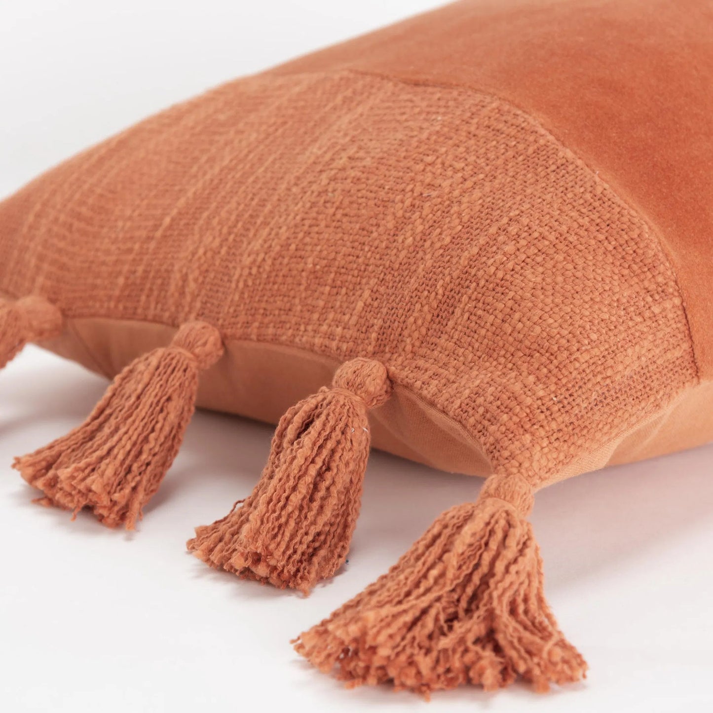 002 SI-2438546 | Closeup | Goshen Pillow by HedgeApple Essentials in burnt orange, muted orange, orange. Made from polyester, cotton velvet in a eclectic & global style.