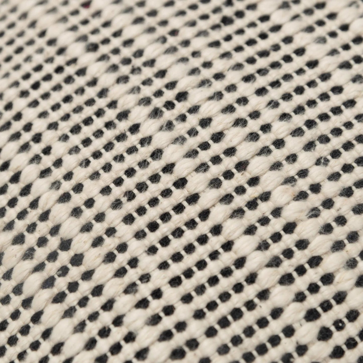 002 SI-2438428 | Closeup | Nippawalla Pillow by HedgeApple Essentials in black, cream. Made from cotton in a transitional style.