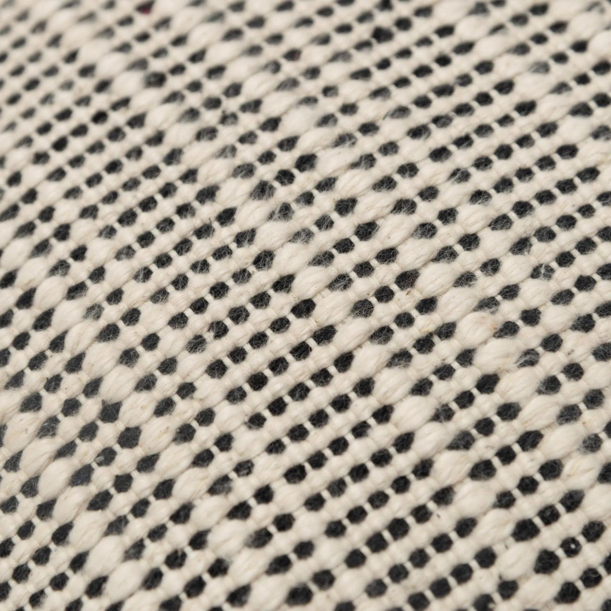 Nippawalla Pillow by HedgeApple Essentials in black, cream. Made from cotton in a transitional style.