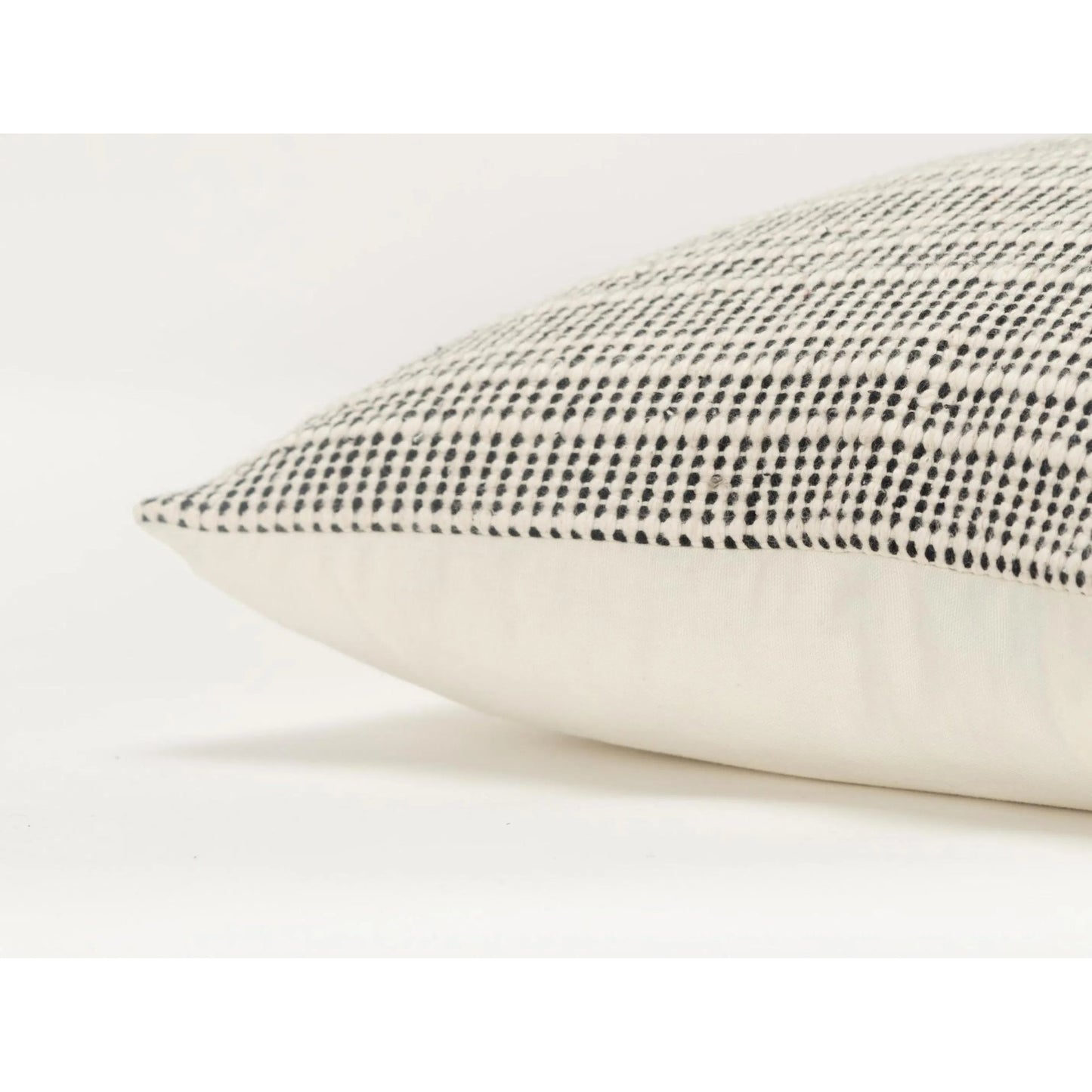 003 SI-2438428 | Closeup | Nippawalla Pillow by HedgeApple Essentials in black, cream. Made from cotton in a transitional style.